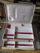 ++"541.16" 61 PIECE SILVER METAL HOUSEWARE EMPTY CABINET