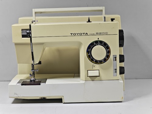 Machine coudre toyota - À,