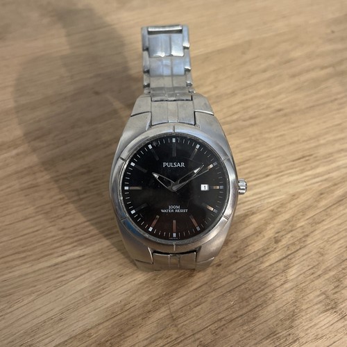 Ancienne montre pulsar - ancienne,