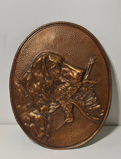 Médaillon mural en cuivre