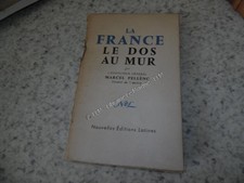 1956.la France le dos au