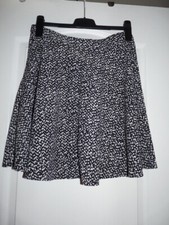 Jupe longueur genou tennis patineuse noir et blanc Etam t. 40 - TBE