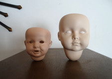 2 têtes de poupées