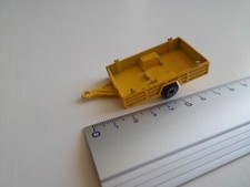 yellow model car trailer one axle 