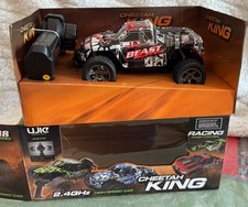 Voiture 4X4 télécommandée 6+ rouge et blanche a piles 