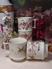 Five Fine Porcelain Coffee Cups 