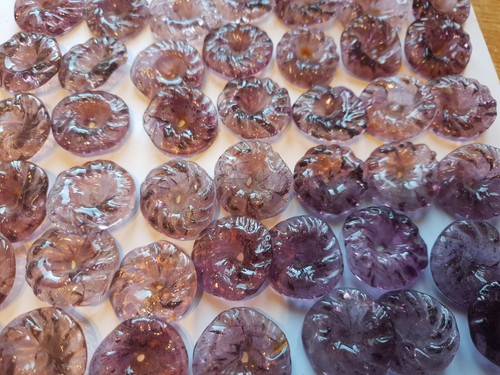 Pampille ronde forme de - en,