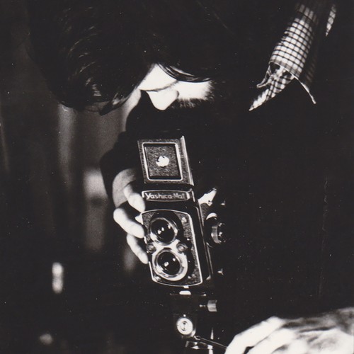 Photographe ajustant