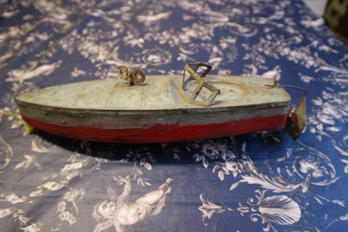 Ancien jouet canot tole a - tole,