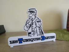 enseigne les tuniques bleues