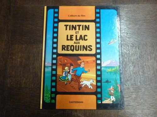 Tintin le - -,