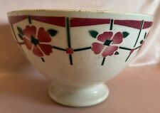 Bol ancien en faïence à décor floral rouge et vert