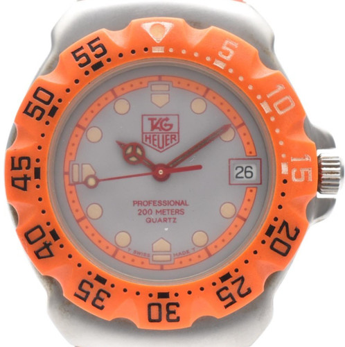 Montre quartz vintage - à,