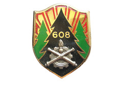 OLD MATERIAL ENAMEL BADGE LA 608° COMPANY STORE FAB. DRAGO PARIS