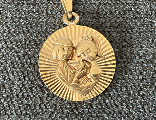 Médaille massif carats - or,