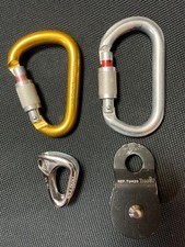 Climbing hardware lot. Petzl carabiners and tibloc. Pulley.