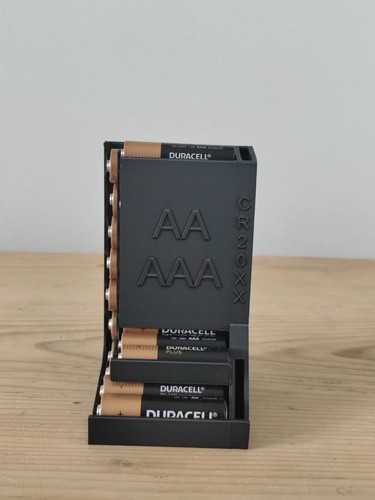 Distributeur rangement piles - distributeur,