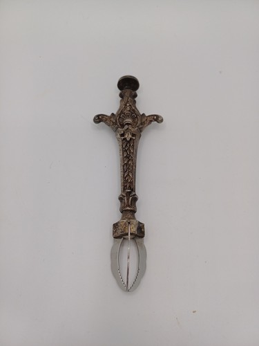 Pince sucre à - /,