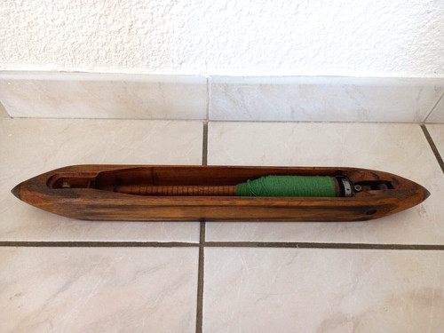 Ancienne navette métier à - de,
