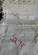 2 taies d'oreiller brodées de