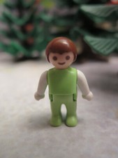 petit enfant bébé vert