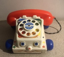 Téléphone Fischer Price vintage old Fischer Price toy- wheeled telephone