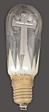 Ancienne ampoule avec croix