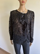 Blouse transparente noire et