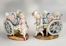 Kister Porzellan-Manufaktur, Germany, Pair of Figural Flower Carts, c.1887