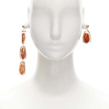 runway JACQUEMUS Les Amandes clear acrylic asymmetric almond drop earrings