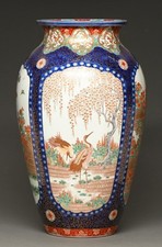 A Japanese Imari Vase, Meiji Period, Enamelled with Alternate Fan-Shaped Panels