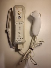 OEM Nintendo Wii Controller and nunchuk combo w/silicone sleeve and wrist strap