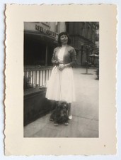 Young Woman Holds Dog Leashes Street White Dress - Vintage Photo Snapshot c. 1960