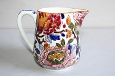 Grand crémier en faïence de