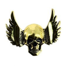 Broche tête de mort ailée