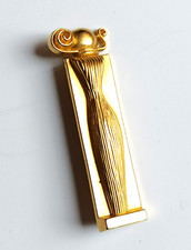 broche dorée colonne Givenchy