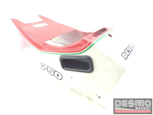 White and red two - -seater, rear