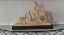 Couple d'antilopes en faïence signé Charles Lemanceau Art déco, avec socle bois.