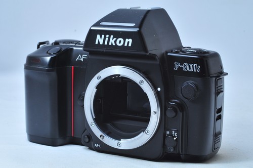Appareil photo reflex - @,