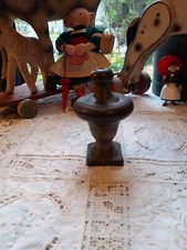 toupie en bronze usage a