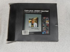 Johnny Hallyday cadre avec 5