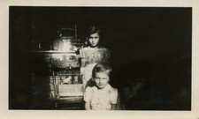 WEIRDLY LIT LITTLE GIRLS & PARAKEET CAGE SUNLIT CREEPY VINTAGE SNAPSHOT PHOTO