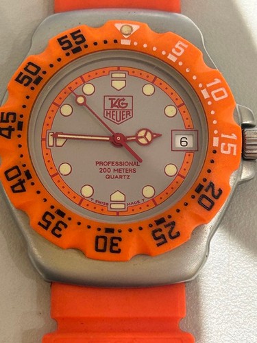 Montre quartz orange pour - à,