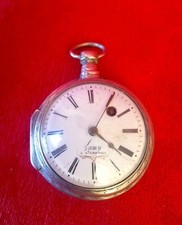 Montre à coq argent signée