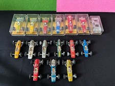 7  voitures de course 1/64 elf