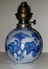 LAMPE A PETROLE FAIENCE DE