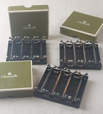 Lot de 12 anciens portes couteaux boules, en métal argenté, Christofle