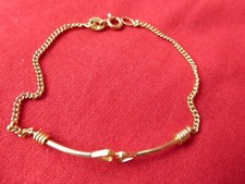 bracelet coeurs neuf 18cm plaqué or de qualité poinçon orfèvre Ste avec symboles