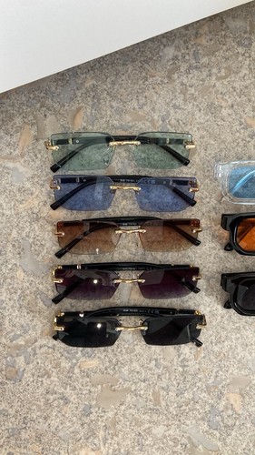 Lot lunettes soleil - de,