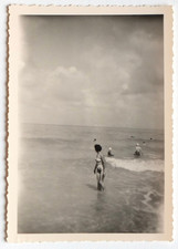 Women's swimsuit sea turns over - old photo snapshot